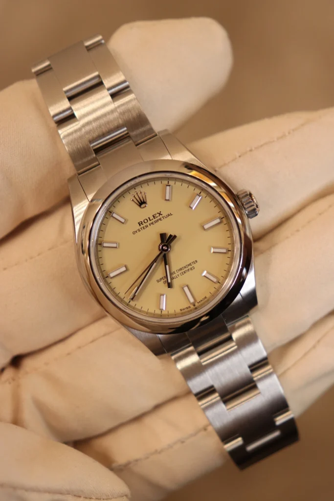 Rolex Oyster Perpetual 31 Oyster Bracelet Smooth Bezel Beige Dial